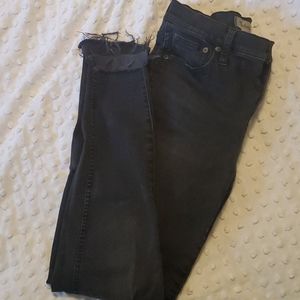 Madewell black wash jeans with frayed hems